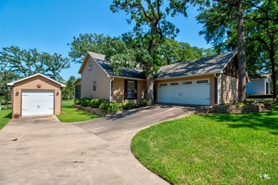 Stunning 5BR, 2.5BA golf course home with lake views on Hole #14 on Lake Kiowa Golf Course in Texas - for sale on GolfHomes.com, golf home, golf lot
