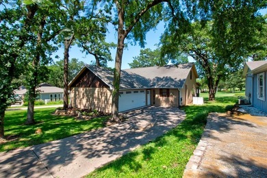 Stunning 5BR, 2.5BA golf course home with lake views on Hole #14 on Lake Kiowa Golf Course in Texas - for sale on GolfHomes.com, golf home, golf lot