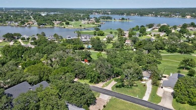 Stunning 5BR, 2.5BA golf course home with lake views on Hole #14 on Lake Kiowa Golf Course in Texas - for sale on GolfHomes.com, golf home, golf lot