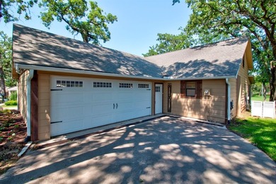 Stunning 5BR, 2.5BA golf course home with lake views on Hole #14 on Lake Kiowa Golf Course in Texas - for sale on GolfHomes.com, golf home, golf lot