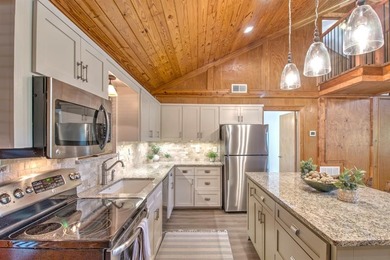 Stunning 5BR, 2.5BA golf course home with lake views on Hole #14 on Lake Kiowa Golf Course in Texas - for sale on GolfHomes.com, golf home, golf lot