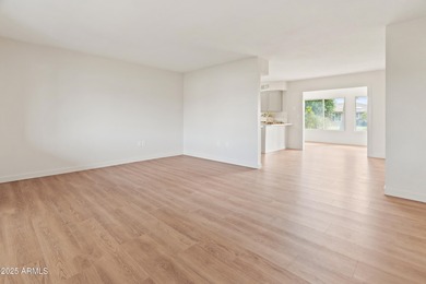 Fresh, bright and updated, this 2BD/2BA Gemini home in Sun City on Sun City Lakes West and East in Arizona - for sale on GolfHomes.com, golf home, golf lot