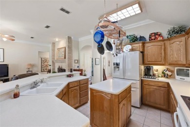 Welcome to this beautifully maintained 4-bedroom, 2-bathroom on Pecan Plantation Country Club in Texas - for sale on GolfHomes.com, golf home, golf lot