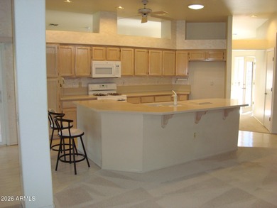 Sought-after expanded Carefree model overlooking the 7th hole of on  in Arizona - for sale on GolfHomes.com, golf home, golf lot