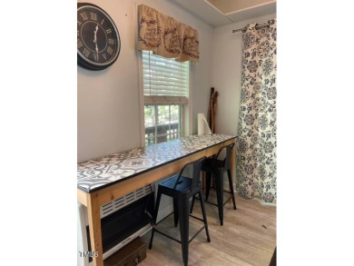 Check out this Affordable Adorable Camper Build over with on River Golf and County Club at Lake Royale in North Carolina - for sale on GolfHomes.com, golf home, golf lot