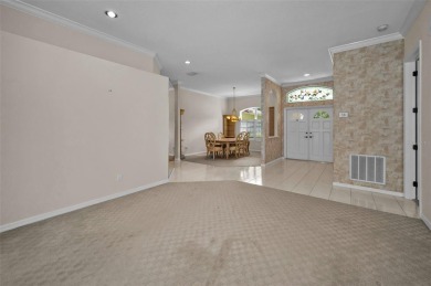 Look forward to coming home! Live on a quiet street in Eastlake on East Lake Woodlands Country Club in Florida - for sale on GolfHomes.com, golf home, golf lot