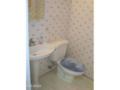 Sought-after expanded Carefree model overlooking the 7th hole of on  in Arizona - for sale on GolfHomes.com, golf home, golf lot