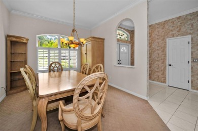 Look forward to coming home! Live on a quiet street in Eastlake on East Lake Woodlands Country Club in Florida - for sale on GolfHomes.com, golf home, golf lot