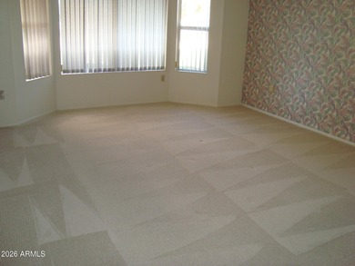 Sought-after expanded Carefree model overlooking the 7th hole of on  in Arizona - for sale on GolfHomes.com, golf home, golf lot