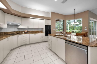 Look forward to coming home! Live on a quiet street in Eastlake on East Lake Woodlands Country Club in Florida - for sale on GolfHomes.com, golf home, golf lot