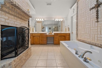 Welcome to this beautifully maintained 4-bedroom, 2-bathroom on Pecan Plantation Country Club in Texas - for sale on GolfHomes.com, golf home, golf lot