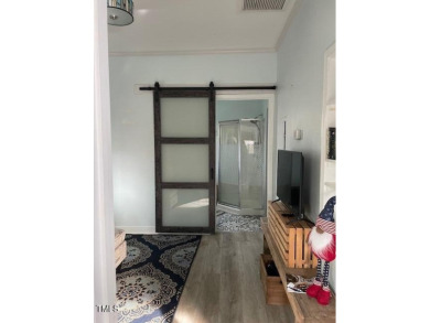 Check out this Affordable Adorable Camper Build over with on River Golf and County Club at Lake Royale in North Carolina - for sale on GolfHomes.com, golf home, golf lot