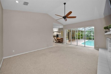 Look forward to coming home! Live on a quiet street in Eastlake on East Lake Woodlands Country Club in Florida - for sale on GolfHomes.com, golf home, golf lot