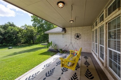 Welcome to this beautifully maintained 4-bedroom, 2-bathroom on Pecan Plantation Country Club in Texas - for sale on GolfHomes.com, golf home, golf lot