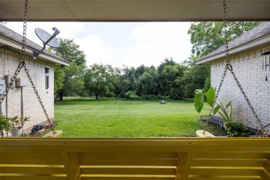 Welcome to this beautifully maintained 4-bedroom, 2-bathroom on Pecan Plantation Country Club in Texas - for sale on GolfHomes.com, golf home, golf lot