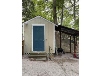 Check out this Affordable Adorable Camper Build over with on River Golf and County Club at Lake Royale in North Carolina - for sale on GolfHomes.com, golf home, golf lot