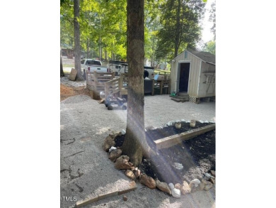 Check out this Affordable Adorable Camper Build over with on River Golf and County Club at Lake Royale in North Carolina - for sale on GolfHomes.com, golf home, golf lot