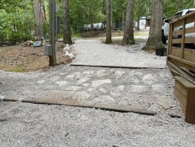 Check out this Affordable Adorable Camper Build over with on River Golf and County Club at Lake Royale in North Carolina - for sale on GolfHomes.com, golf home, golf lot