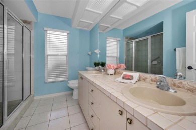 Look forward to coming home! Live on a quiet street in Eastlake on East Lake Woodlands Country Club in Florida - for sale on GolfHomes.com, golf home, golf lot