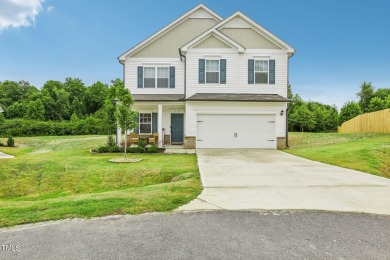 Welcome to your serene retreat nestled in a tranquil country on Reedy Creek Golf Course in North Carolina - for sale on GolfHomes.com, golf home, golf lot