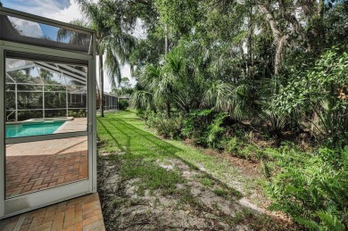 Look forward to coming home! Live on a quiet street in Eastlake on East Lake Woodlands Country Club in Florida - for sale on GolfHomes.com, golf home, golf lot