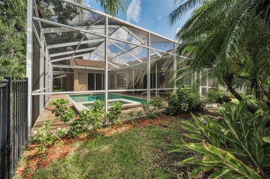 Look forward to coming home! Live on a quiet street in Eastlake on East Lake Woodlands Country Club in Florida - for sale on GolfHomes.com, golf home, golf lot