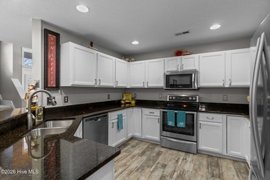 This exceptionally spacious brick townhome offers over 1,900 on Masonboro Country Club in North Carolina - for sale on GolfHomes.com, golf home, golf lot