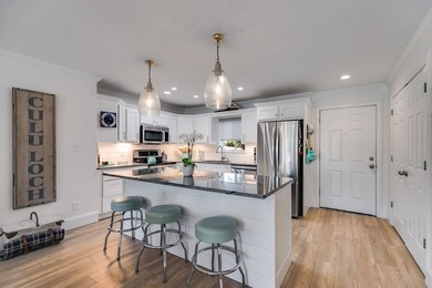 Experience lakefront living at its finest in this fully updated on Fairfield Plantation Golf and Country Club in Georgia - for sale on GolfHomes.com, golf home, golf lot