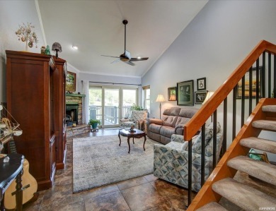 Discover your dream home that boasts breathtaking lake and golf on Diamondhead Golf and Country Club in Arkansas - for sale on GolfHomes.com, golf home, golf lot