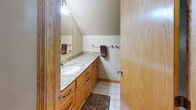 The home at 207 Redwood Drive is located near the Crystal Beach on Woodward Municipal Golf Course in Oklahoma - for sale on GolfHomes.com, golf home, golf lot