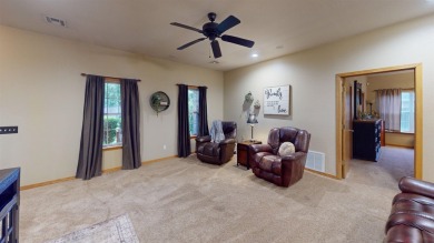 The home at 207 Redwood Drive is located near the Crystal Beach on Woodward Municipal Golf Course in Oklahoma - for sale on GolfHomes.com, golf home, golf lot