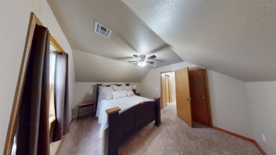 The home at 207 Redwood Drive is located near the Crystal Beach on Woodward Municipal Golf Course in Oklahoma - for sale on GolfHomes.com, golf home, golf lot