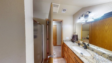 The home at 207 Redwood Drive is located near the Crystal Beach on Woodward Municipal Golf Course in Oklahoma - for sale on GolfHomes.com, golf home, golf lot