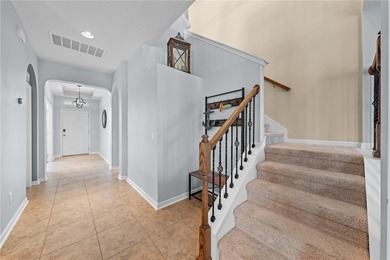 Welcome to an exceptional two-story residence nestled on a quiet on Oaks National Golf Course in Florida - for sale on GolfHomes.com, golf home, golf lot