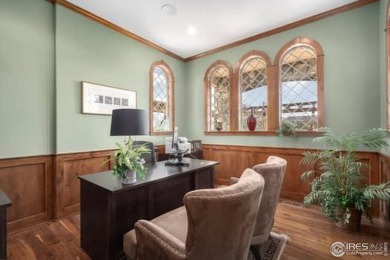 This custom ranch home on a stunning waterfront lot offers an on Pelican Lakes Golf and Country Club in Colorado - for sale on GolfHomes.com, golf home, golf lot