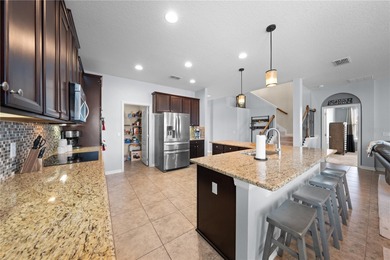 Welcome to an exceptional two-story residence nestled on a quiet on Oaks National Golf Course in Florida - for sale on GolfHomes.com, golf home, golf lot