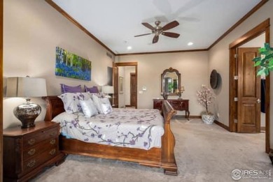 This custom ranch home on a stunning waterfront lot offers an on Pelican Lakes Golf and Country Club in Colorado - for sale on GolfHomes.com, golf home, golf lot