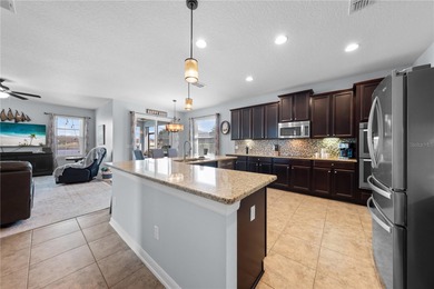 Welcome to an exceptional two-story residence nestled on a quiet on Oaks National Golf Course in Florida - for sale on GolfHomes.com, golf home, golf lot