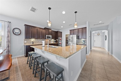 Welcome to an exceptional two-story residence nestled on a quiet on Oaks National Golf Course in Florida - for sale on GolfHomes.com, golf home, golf lot