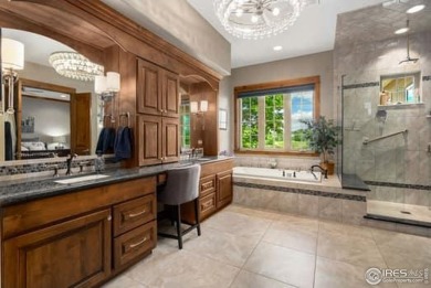 This custom ranch home on a stunning waterfront lot offers an on Pelican Lakes Golf and Country Club in Colorado - for sale on GolfHomes.com, golf home, golf lot