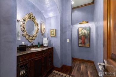 This custom ranch home on a stunning waterfront lot offers an on Pelican Lakes Golf and Country Club in Colorado - for sale on GolfHomes.com, golf home, golf lot