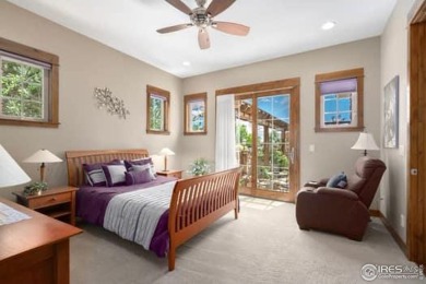 This custom ranch home on a stunning waterfront lot offers an on Pelican Lakes Golf and Country Club in Colorado - for sale on GolfHomes.com, golf home, golf lot