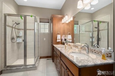 This custom ranch home on a stunning waterfront lot offers an on Pelican Lakes Golf and Country Club in Colorado - for sale on GolfHomes.com, golf home, golf lot