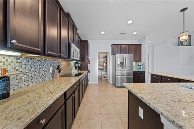 Welcome to an exceptional two-story residence nestled on a quiet on Oaks National Golf Course in Florida - for sale on GolfHomes.com, golf home, golf lot