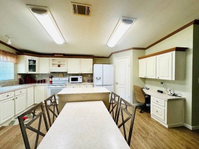 Immaculate Triple-Wide Beauty! Spacious 3 Bed / 2 Bath in on Schalamar Creek Golf and Country Club in Florida - for sale on GolfHomes.com, golf home, golf lot
