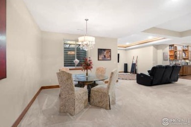 This custom ranch home on a stunning waterfront lot offers an on Pelican Lakes Golf and Country Club in Colorado - for sale on GolfHomes.com, golf home, golf lot
