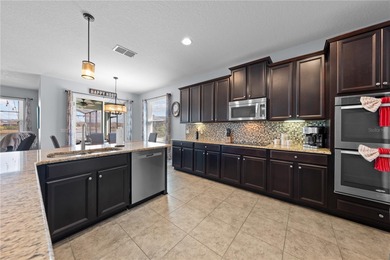 Welcome to an exceptional two-story residence nestled on a quiet on Oaks National Golf Course in Florida - for sale on GolfHomes.com, golf home, golf lot