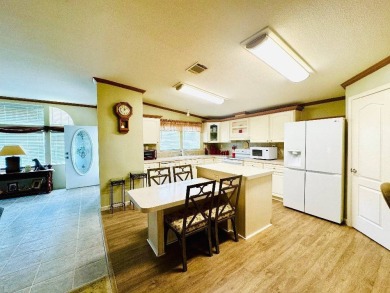 Immaculate Triple-Wide Beauty! Spacious 3 Bed / 2 Bath in on Schalamar Creek Golf and Country Club in Florida - for sale on GolfHomes.com, golf home, golf lot