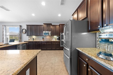 Welcome to an exceptional two-story residence nestled on a quiet on Oaks National Golf Course in Florida - for sale on GolfHomes.com, golf home, golf lot