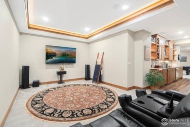 This custom ranch home on a stunning waterfront lot offers an on Pelican Lakes Golf and Country Club in Colorado - for sale on GolfHomes.com, golf home, golf lot